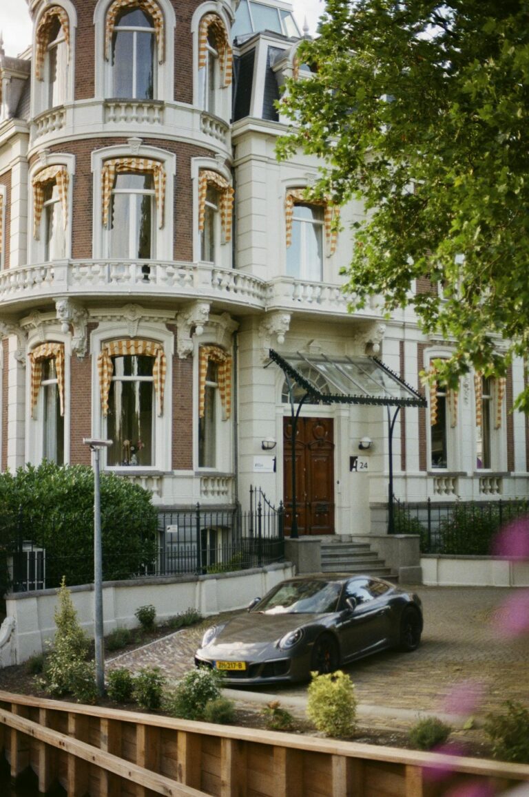 Dutch residential architecture with a luxury car in Amsterdam, NH.