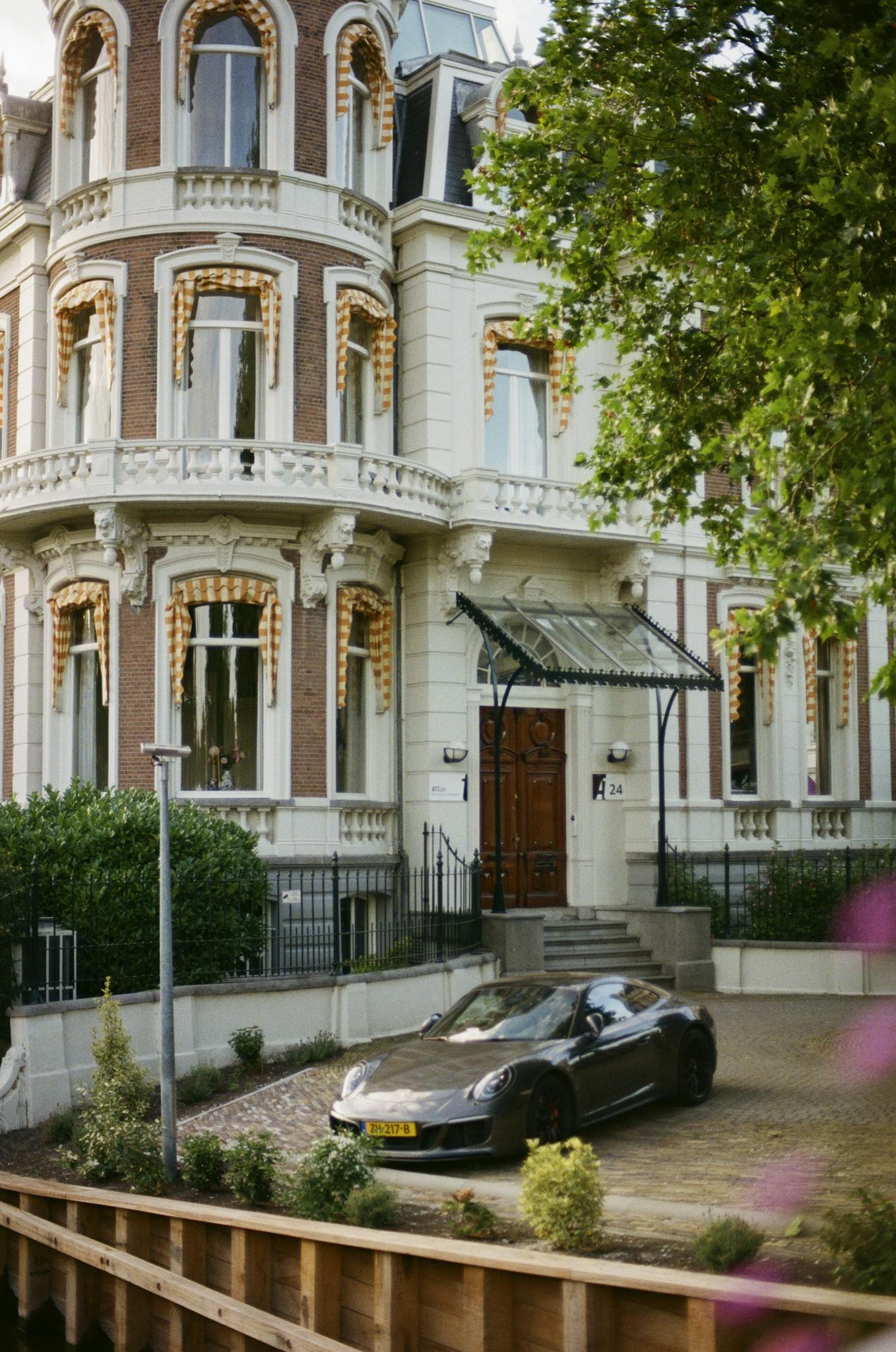 Dutch residential architecture with a luxury car in Amsterdam, NH.